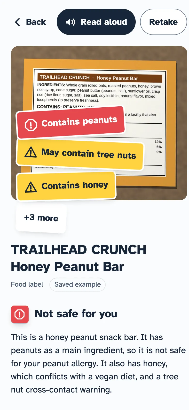 The snack bar photo with a red Contains peanuts sticker and other warnings stuck on it.